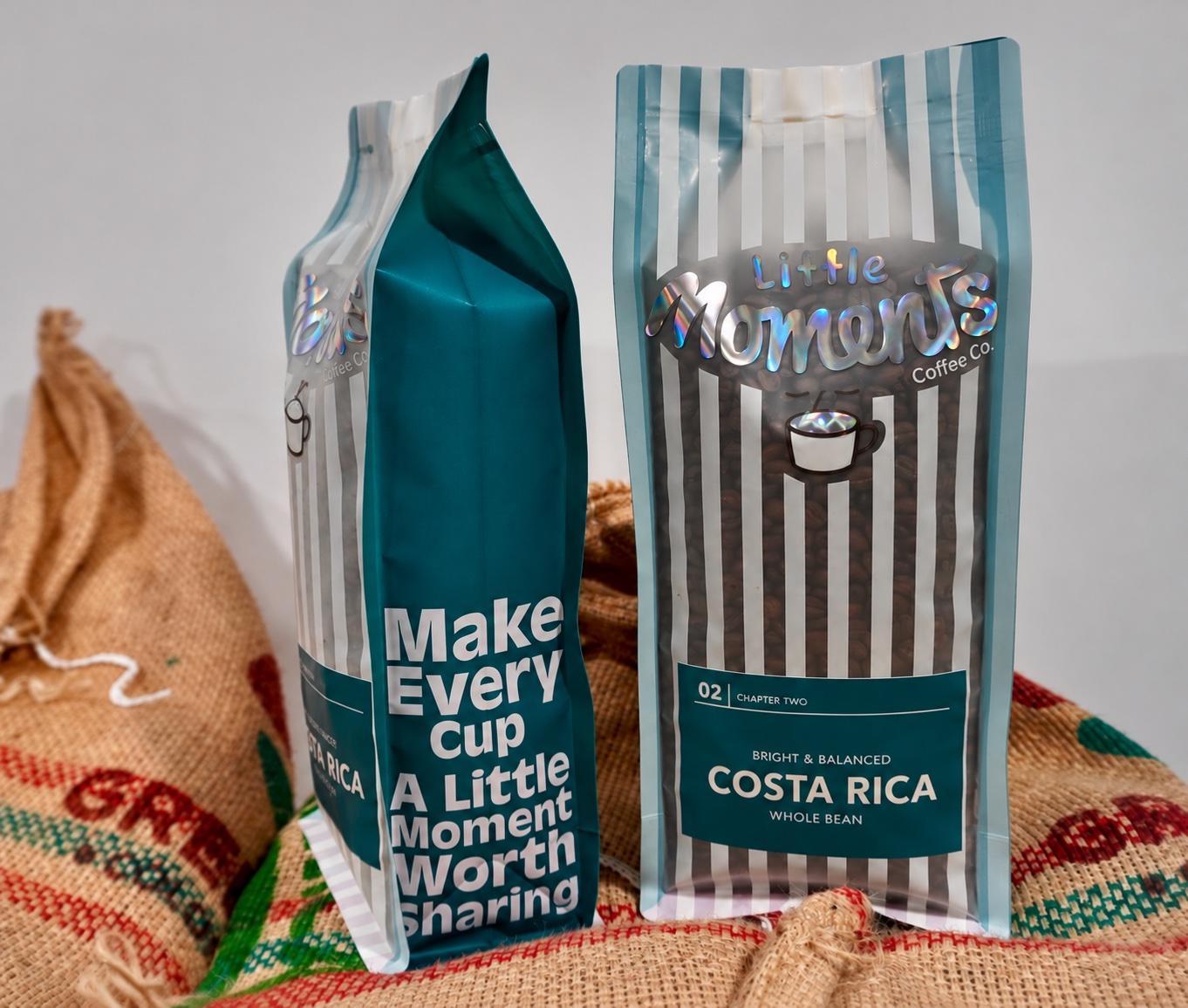 Two bags of Chapter Two Costa Rica standing on jute coffee sacks