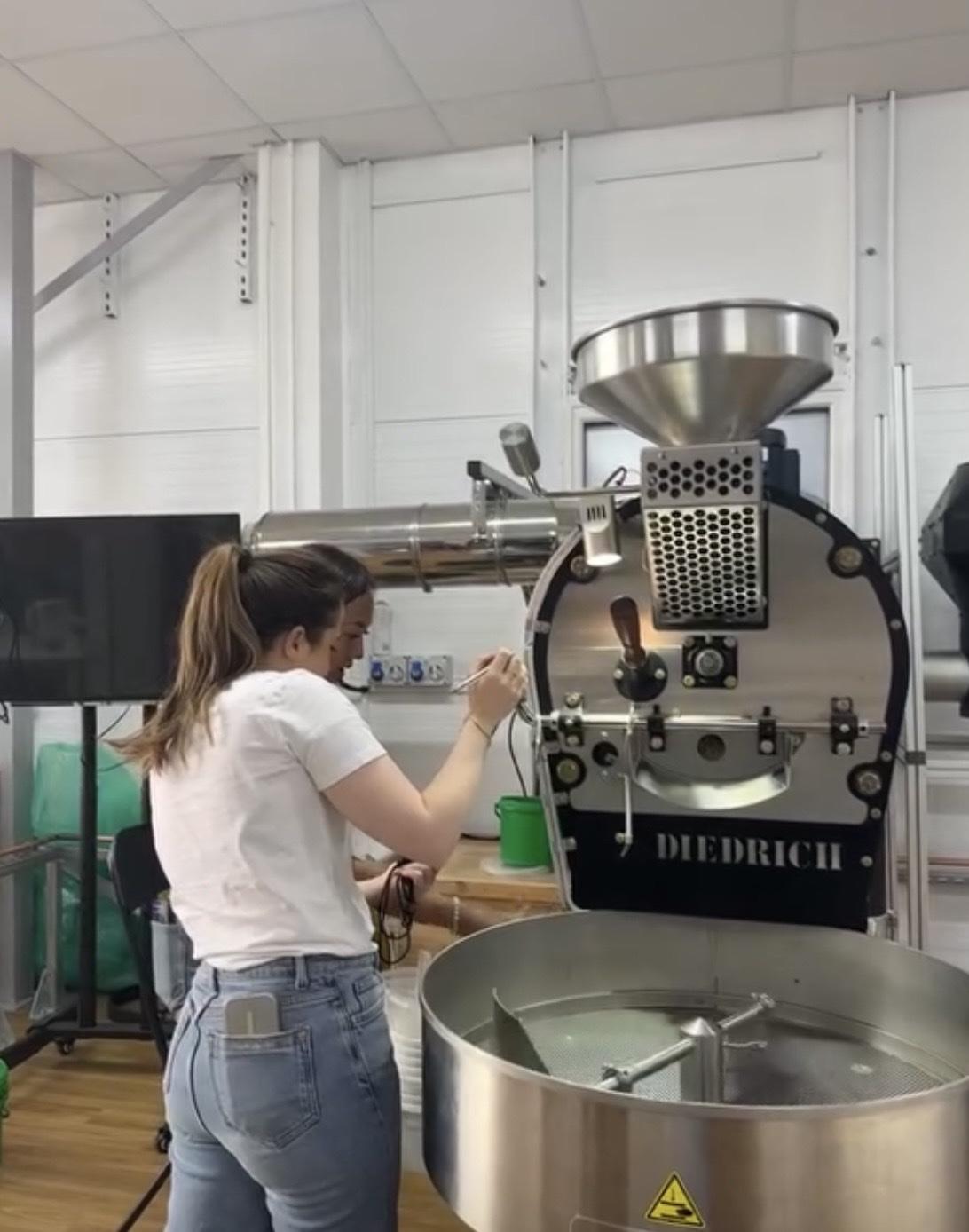 Erin roasting on a Diedrich coffee roaster during her training